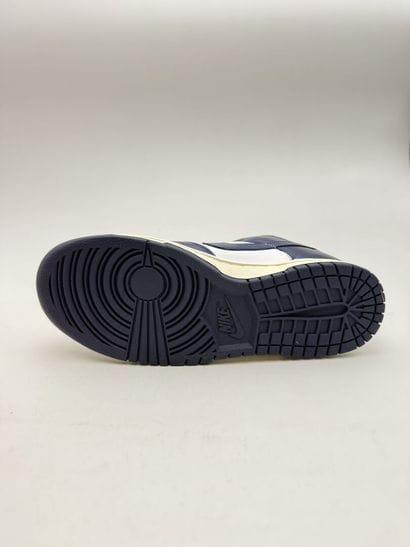 NIKE 
Pair of white and navy blue DUNK LOW...