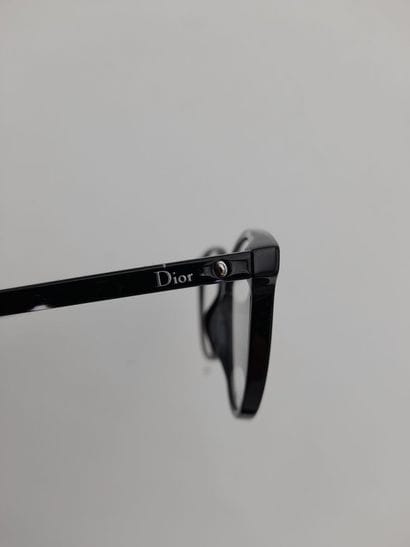 CHRISTIAN DIOR, PARIS.
A pair of black plastic...