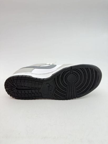 NIKE 
Pair of gray and white DUNK low-top...
