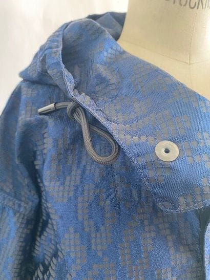 GIVENCHY
Blue and black parka 
Size 48
Like...