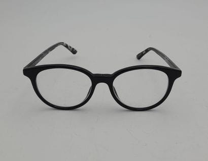 CHRISTIAN DIOR, PARIS.
A pair of black plastic...