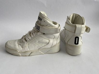 GIVENCHY. 
Pair of Chris Lee white leather...