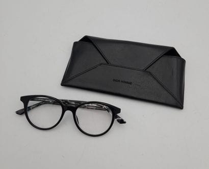 CHRISTIAN DIOR, PARIS.
A pair of black plastic...