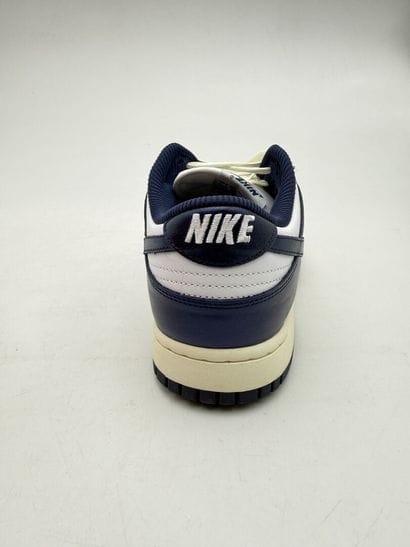 NIKE 
Pair of white and navy blue DUNK LOW...