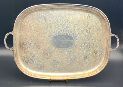 A rectangular serving tray made of silver...