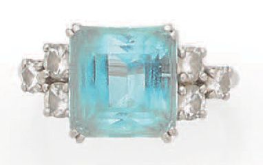 Ring decorated with a square aquamarine with...