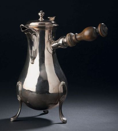 Tripod silver pourer, baluster-shaped, the...