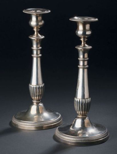 Pair of torches and their silver bobèches,...