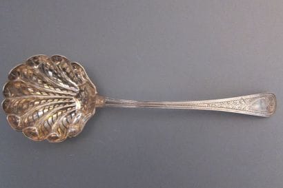 Silver sprinkling spoon, curved model, engraved...
