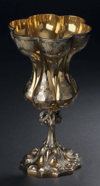 A vermeil hanap resting on a polylobed base,...