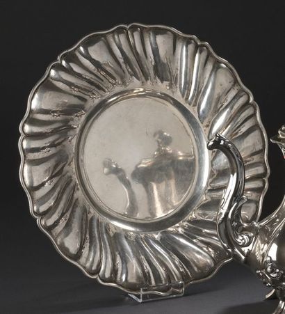 Round silver dish 900‰, the marli with torsos...