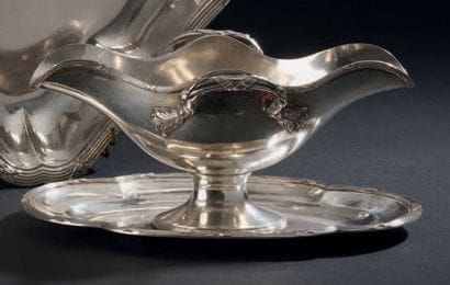 Silver shuttle sauce boat with two spouts...