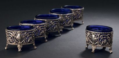 Set of six silver openwork salerons decorated...