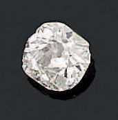 Antique cut cushion diamond on paper.
Weight:...