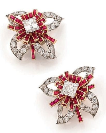 CARTIER
Pair of flower-shaped ear clips composed...