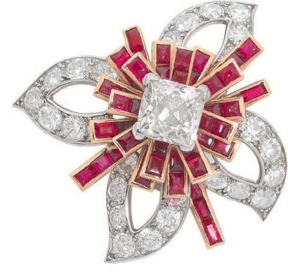 CARTIER
Pair of flower-shaped ear clips composed...
