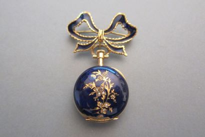 18K yellow gold brooch (750‰) enamelled blue...