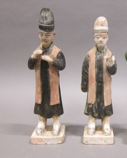 Deux personnages en terre cuite émaillée...