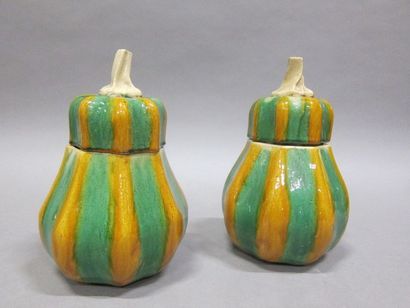 Deux pots en faïence en forme de courges...