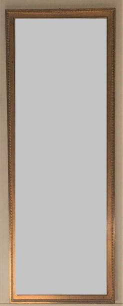 Miroir d'entre-deux en bois et stuc doré,...