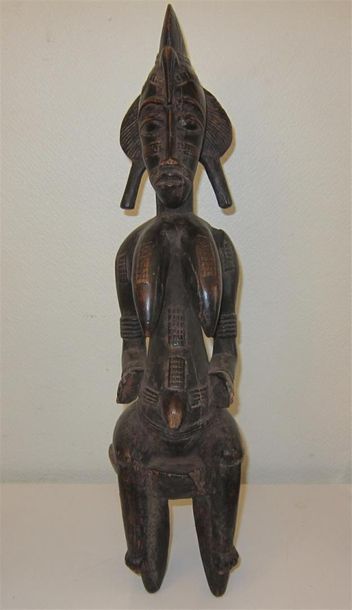 Statue africaine féminine au corps scarifié...