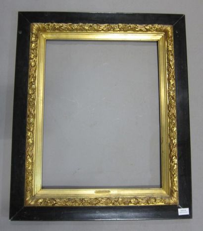 -Miroir en bois polychrome à décor de colonnes....