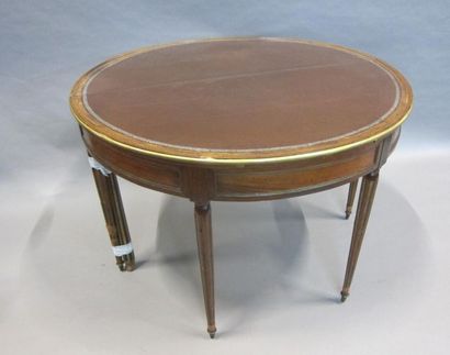 Table demi-lune en placage d'acajou, à plateau...