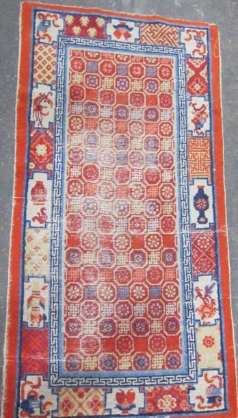 Lot de quatre tapis en laine, Iran début...