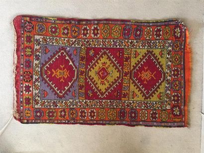 Lot de 4 petits tapis d'Asie centrale