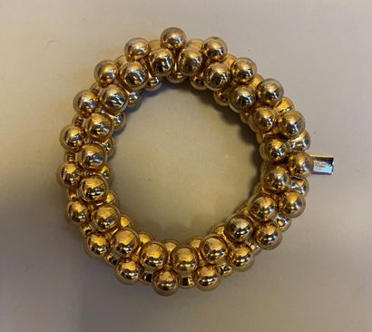 ETRO

Bracelet en métal doré articulé, signé...