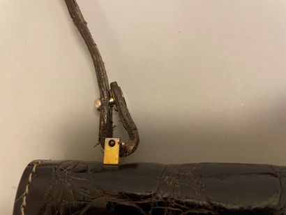 CELINE

Sac en cuir marron façon reptile,...