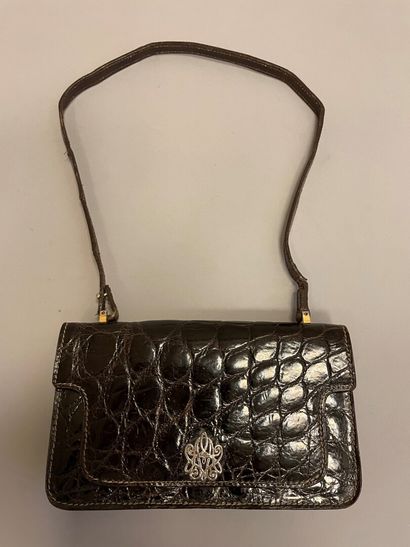 CELINE

Sac en cuir marron façon reptile,...