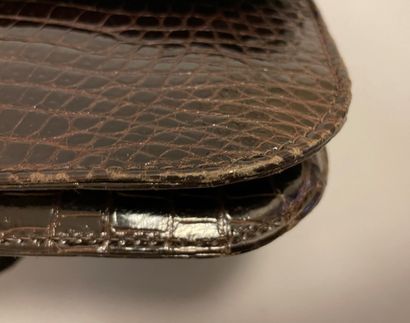 Jean PATOU

Sac en cuir marron façon reptile,...