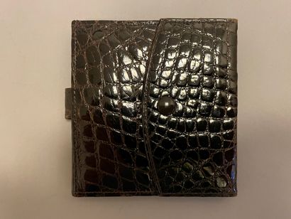 Jean PATOU

Sac en cuir marron façon reptile,...