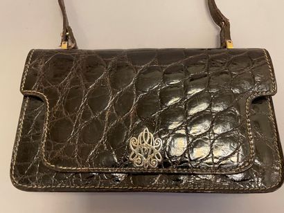 CELINE

Sac en cuir marron façon reptile,...