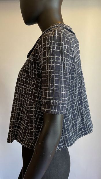 Christian DIOR

Ensemble en jersey bleu marine...