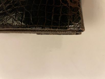 Jean PATOU

Sac en cuir marron façon reptile,...