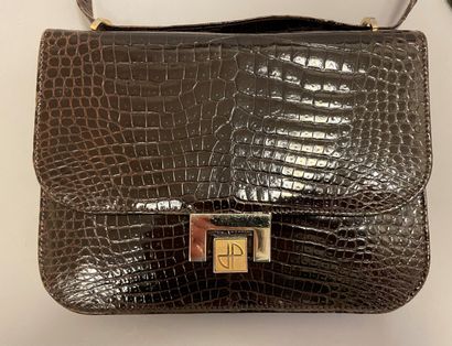 Jean PATOU

Sac en cuir marron façon reptile,...