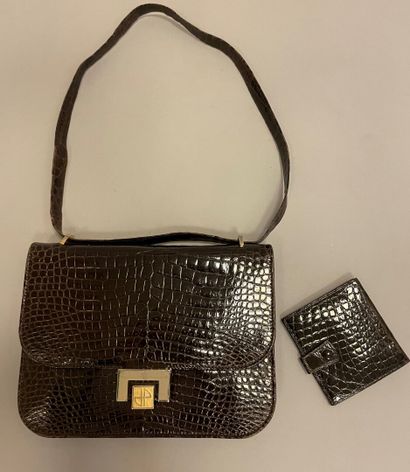 Jean PATOU

Sac en cuir marron façon reptile,...