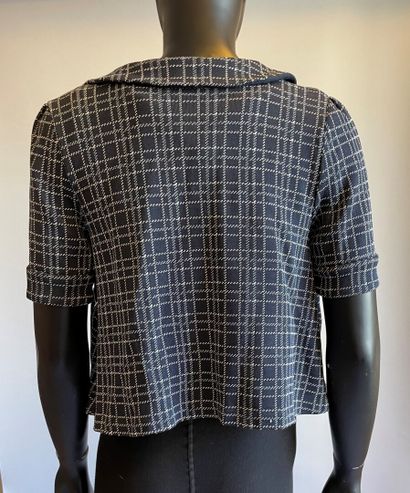 Christian DIOR

Ensemble en jersey bleu marine...