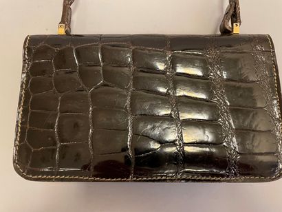 CELINE

Sac en cuir marron façon reptile,...