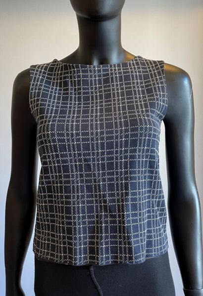 Christian DIOR

Ensemble en jersey bleu marine...
