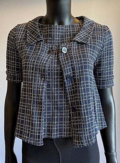 Christian DIOR

Ensemble en jersey bleu marine...