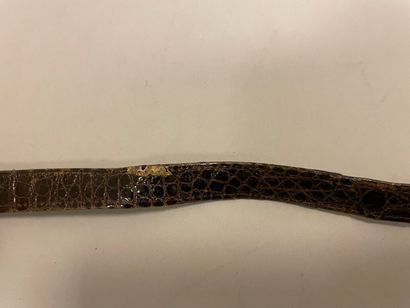 Jean PATOU

Sac en cuir marron façon reptile,...