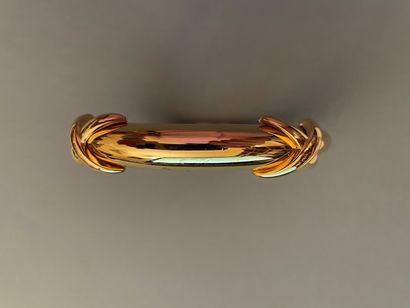 MONET

Bracelet jonc en métal doré orné de...