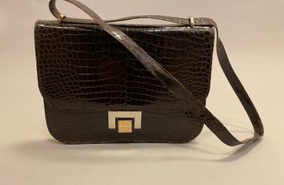 Jean PATOU

Sac en cuir marron façon reptile,...