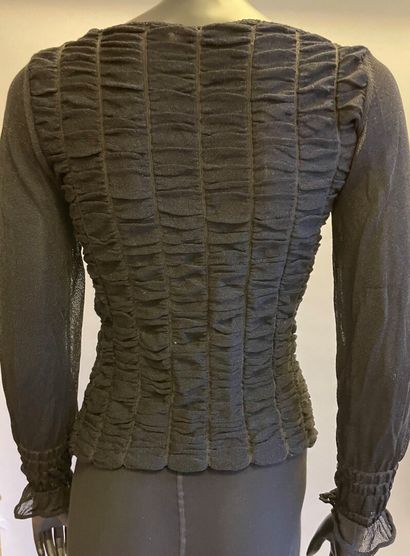 Christian LACROIX Bazar

Haut noir plissé...