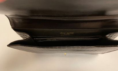 Jean PATOU

Sac en cuir marron façon reptile,...