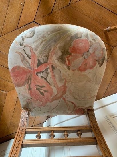 Two carved and molded wood chairs decorated...
