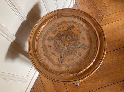 Circular wooden table with inlaid decoration...